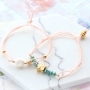 Summery bracelets with coloured elastic cord and colourful beads