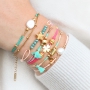 Summery bracelets with coloured elastic cord and colourful beads