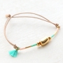 Summery bracelets with coloured elastic cord and colourful beads