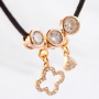 Create festive necklaces with pretty medallion, rhinestone and letter charms