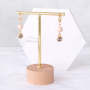 Bracelets and earrings with botanical colours and golden details