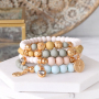 Bracelets and earrings with botanical colours and golden details