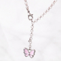 Girly jewellery with cheerful metal charms and soft colours