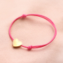 Need some inspiration? It's easy to make trendy bracelets out of elastic cord: