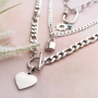 This is how you style the latest chain necklaces and chain bracelets: 
