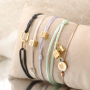 Take a look at how to create stylish jewellery with stainless steel cube letter beads: 