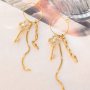 Design earrings and necklaces with key charms