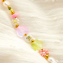 How to create earrings and a telephone cord with glass beads