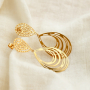 Get creative with stainless steel charms for statement earrings