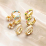 Inspiration time with brass TQ metal creoles with flowers