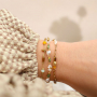 Get creative with oval glass beads with gold rim