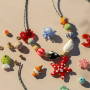 Make colourful necklaces with glass charms