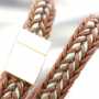 Fashionably bracelets made of waxed cord with different items of Designer Quality metal