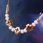 Jewellery set with an ethnic look made of DQ metal in rose gold & macram&eacute; string!