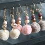 Create a &ldquo;wow&rdquo; effect with these sparkling earrings with faceted beads, pompoms and golden DQ metal findings.